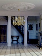 Ann De Silva has used columns to enhance this beautiful hallway and staircase
